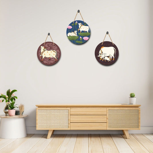 Celestial Cow Trio: Handcrafted Wall Art