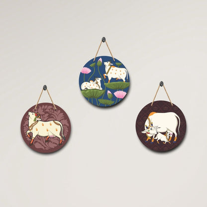 Celestial Cow Trio: Handcrafted Wall Art